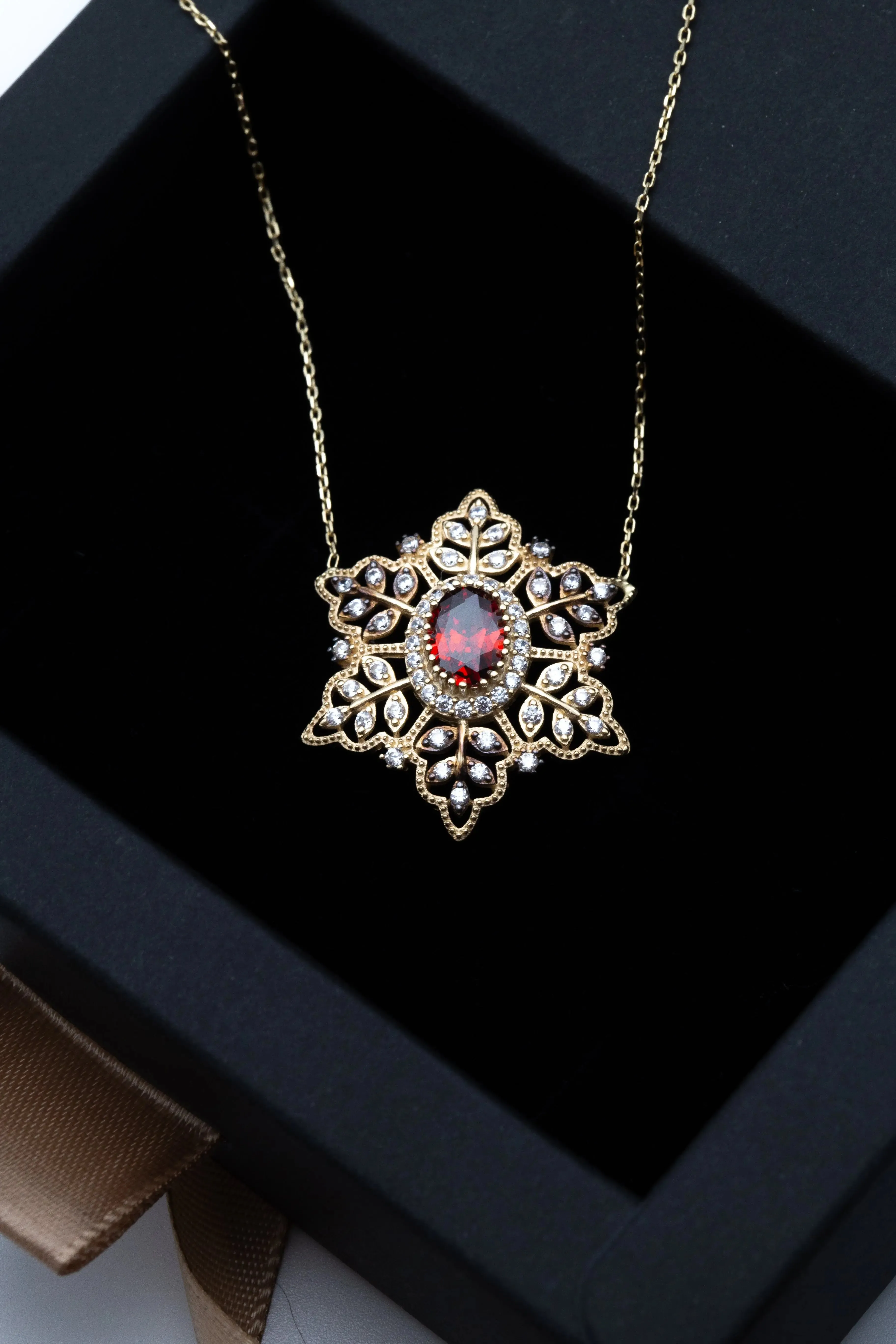 14K Yellow Gold Red Stoned Snowflake Necklace
