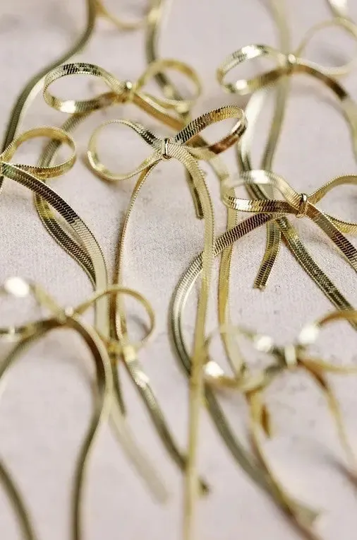Maxi Gold Duster Bow Earrings