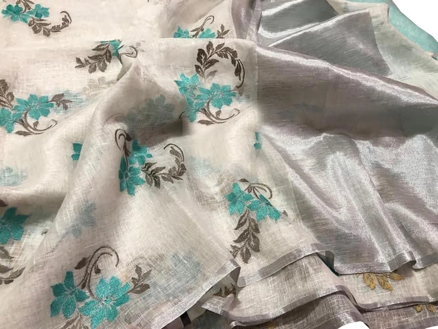 Stunning Off White Linen Saree with Intricate Embroidery